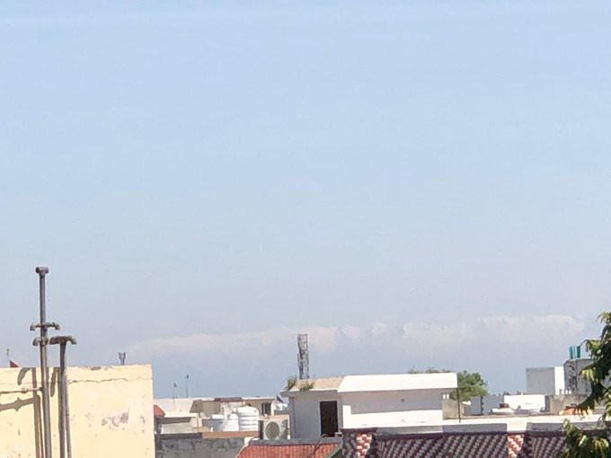 Punjab India: Rooftop view of Himalayas prior to COVID-19 shelter in place (Obtained from: Manjit K Kang)