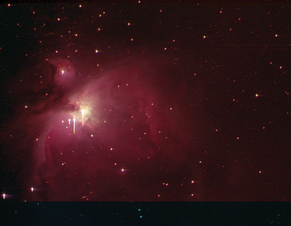 Sample student work: Example of a processed true color image of the Orion Nebula that a student created using the tools in JS9, combining individual image files taken with green, red, and blue filters.