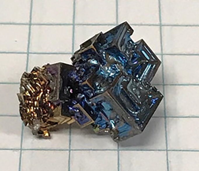 99.9% pure bismuth, extruded with rolled aluminum foil dipstick after partial freeze.
